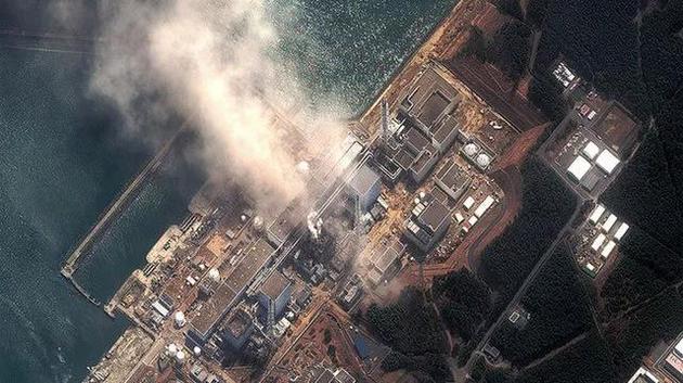 2011年3月14日，福島第一核電站的衛星圖片，此時已經有兩個反應堆發生爆炸